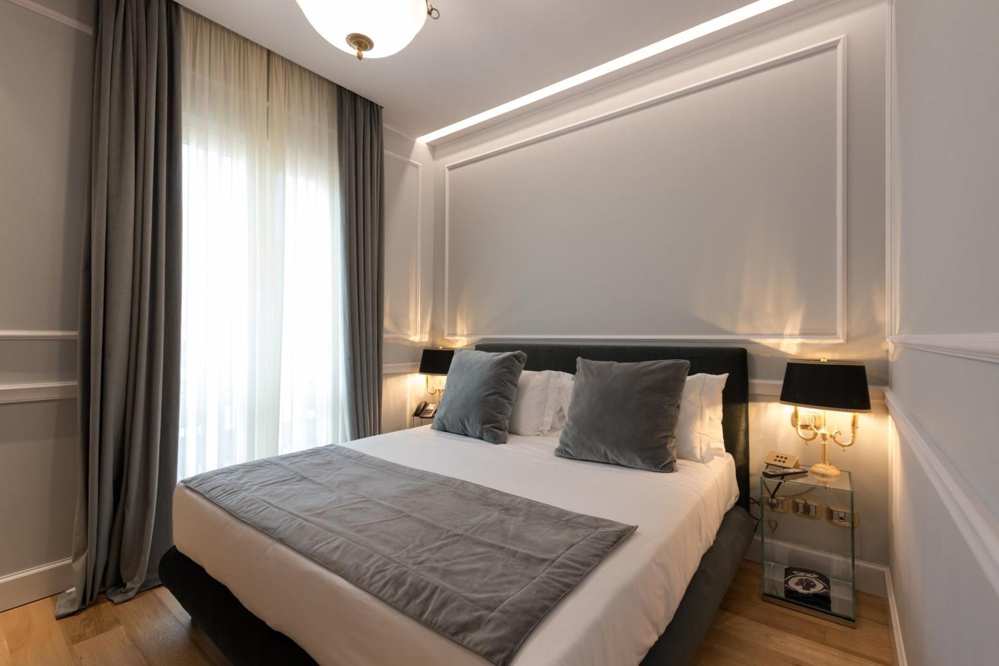 Grand Hotel Et Des Palmes Palermo Luaran gambar A bedroom at the hotel